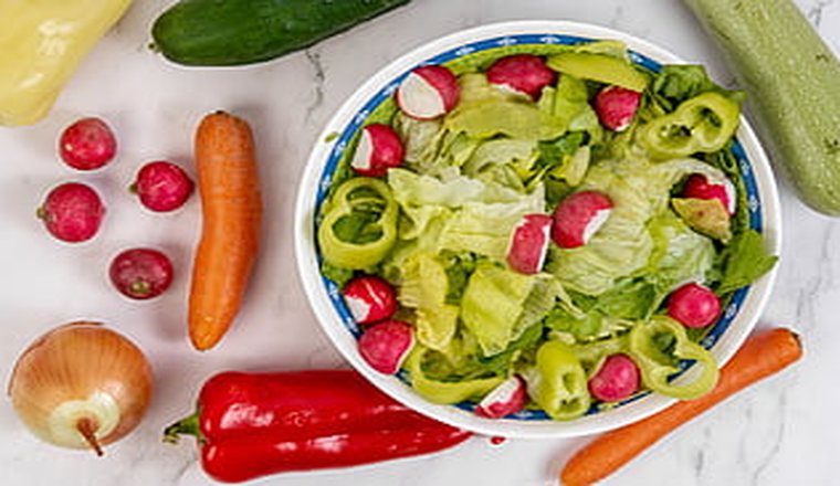 Fresh salad bowl with colorful vegetables