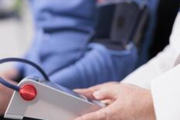Doctor measuring a patient's blood pressure